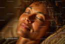 Intimate Portrait of a Relaxed Young Woman with Curly Hair