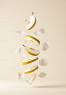 Floating Pear Slices Surrounded by White Flower Petals