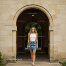 Casual Summer Look of Young Woman in Denim Skirt