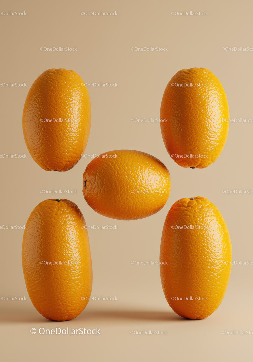 Fresh kumquats arranged in balanced formation on beige