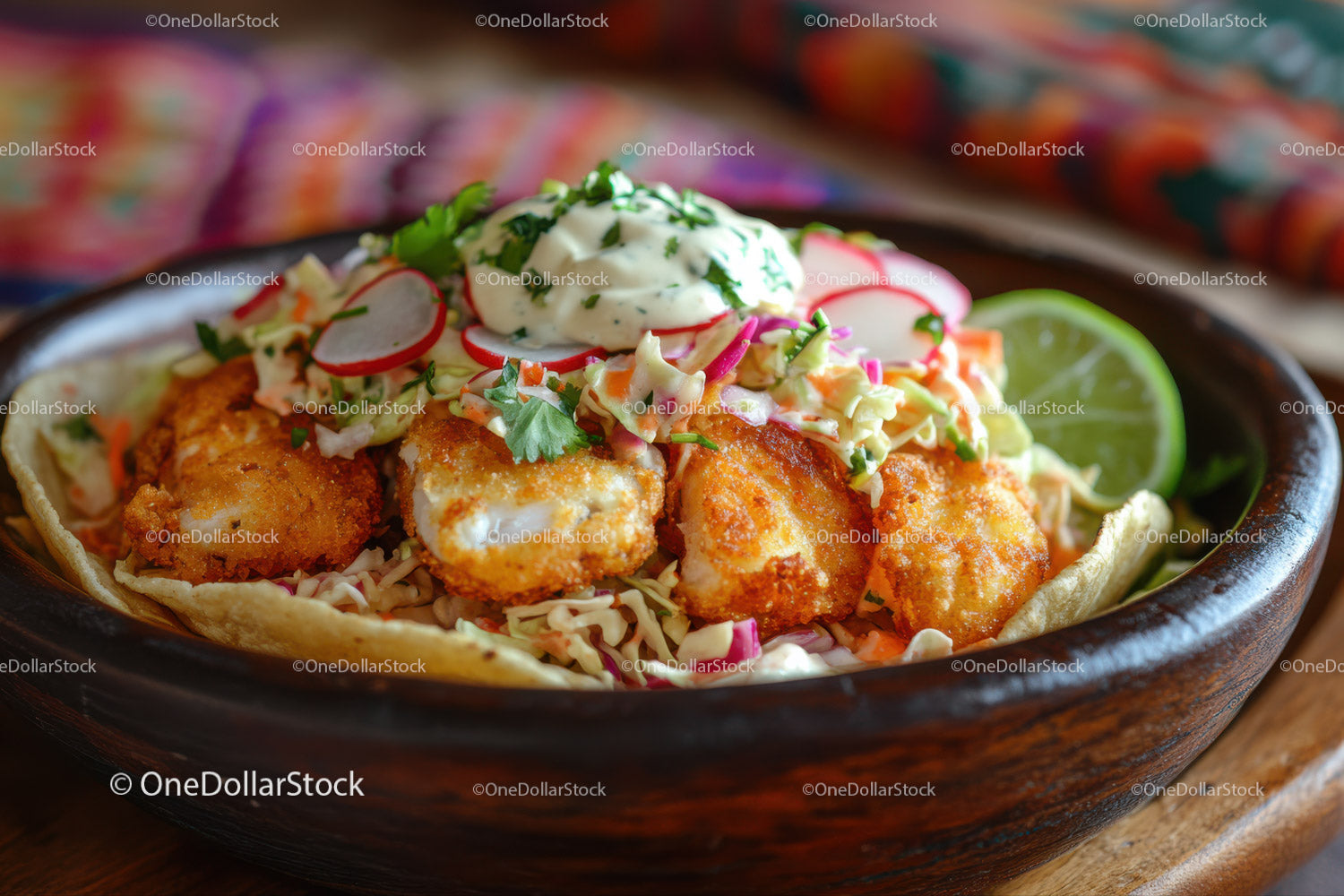 Crispy Fish Tacos with Coleslaw and Lime in a Rustic Bowl