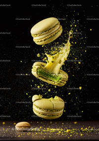 Green Pistachio Macarons Breaking with Cream Filling