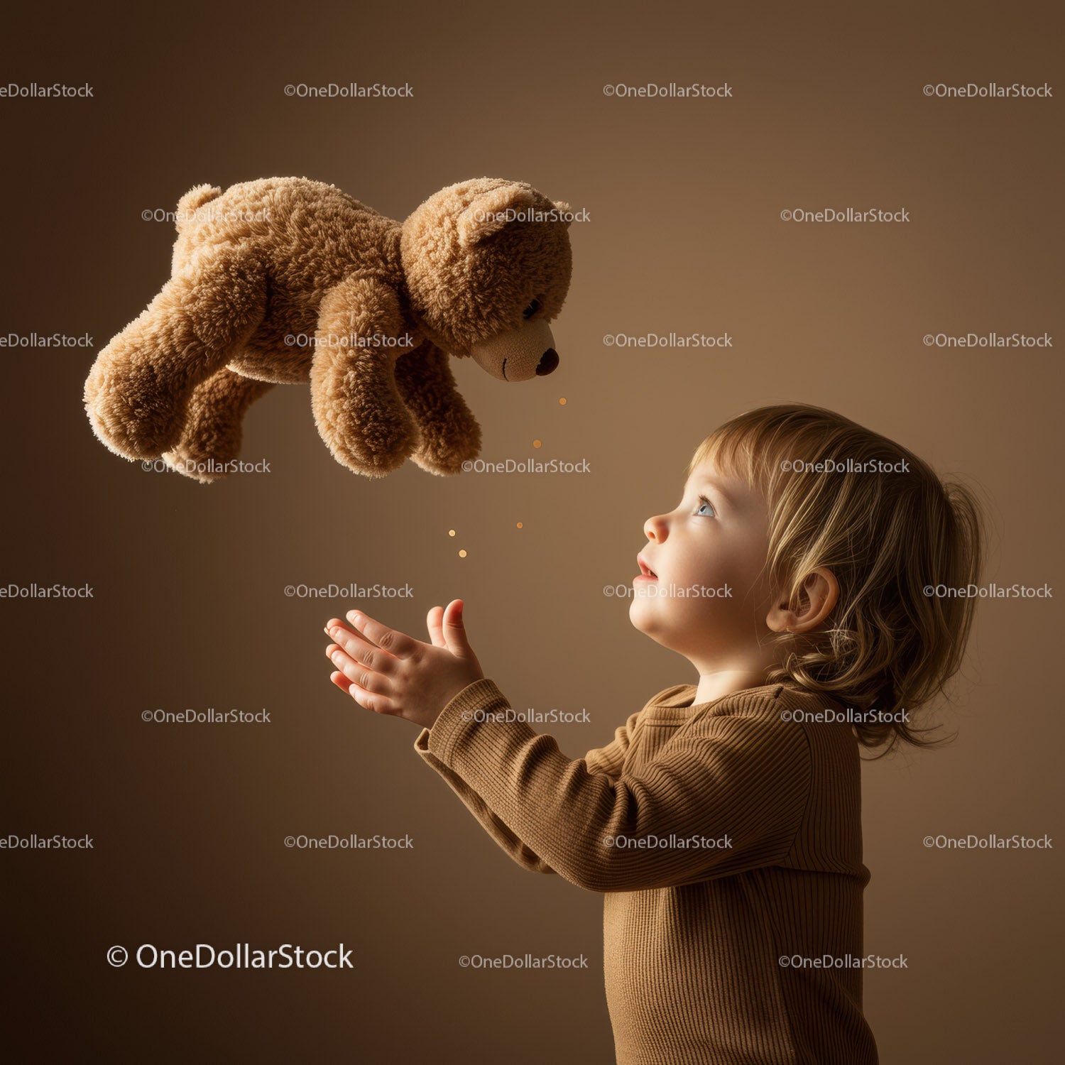 Toddler Looking Up at Floating Teddy Bear in Warm Light