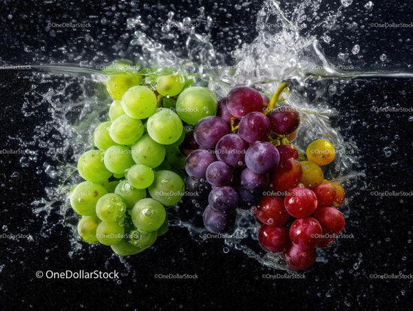 Fresh Green and Purple Grapes Splashing into Water