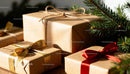 Festive holiday gifts wrapped in kraft paper with ribbons