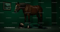 Woman Lying on Floor Beside a Horse in Dramatic Green Room