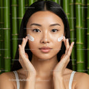 Close-up of an Asian Woman Applying Skin Cream for a Healthy Glow