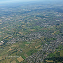 Aerial View of Green Fields and Town with Modern Infrastructure