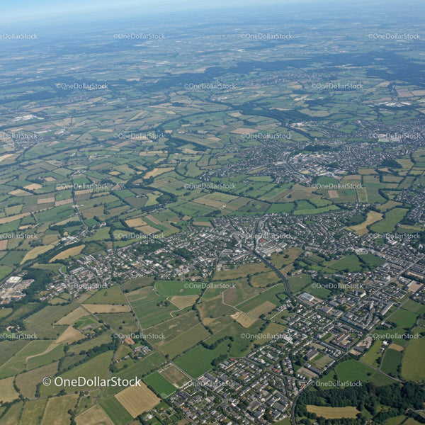 Aerial View of Green Fields and Town with Modern Infrastructure
