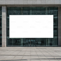 Modern Building Entrance with Large Blank Billboard