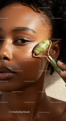 Natural Black Woman Using Jade Roller for Facial Massage and Skin Care