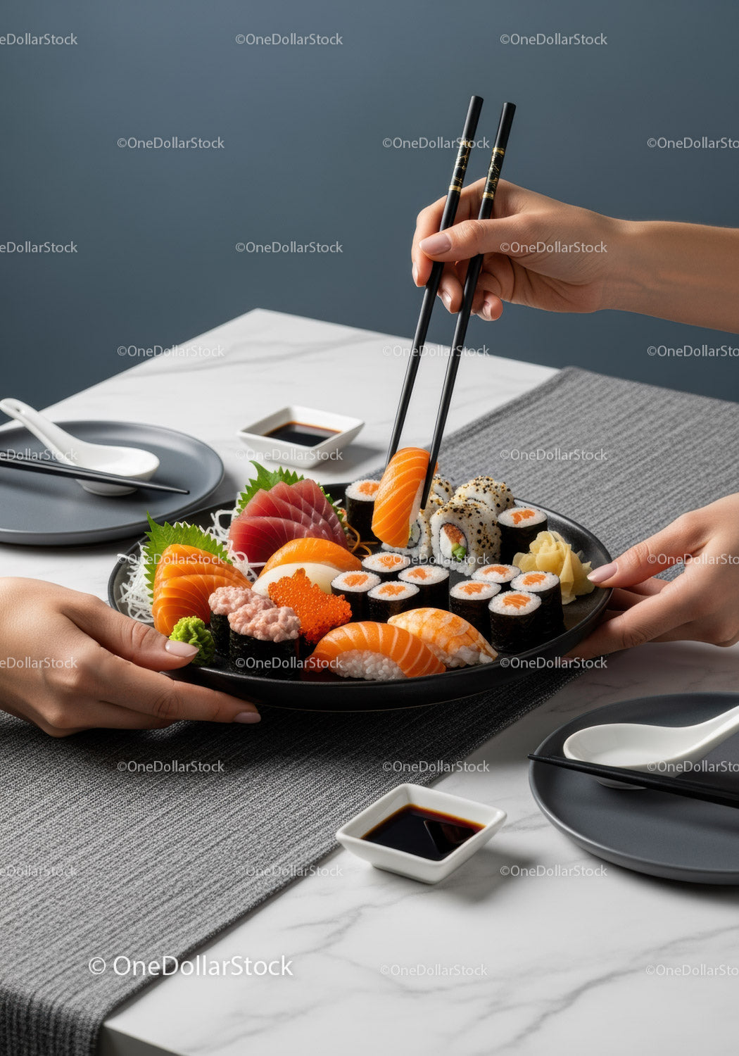 Fresh Sushi Platter with Salmon, Tuna and Sushi Rolls on Black Plate