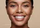 Close up of smiling woman with radiant skin and perfect teeth