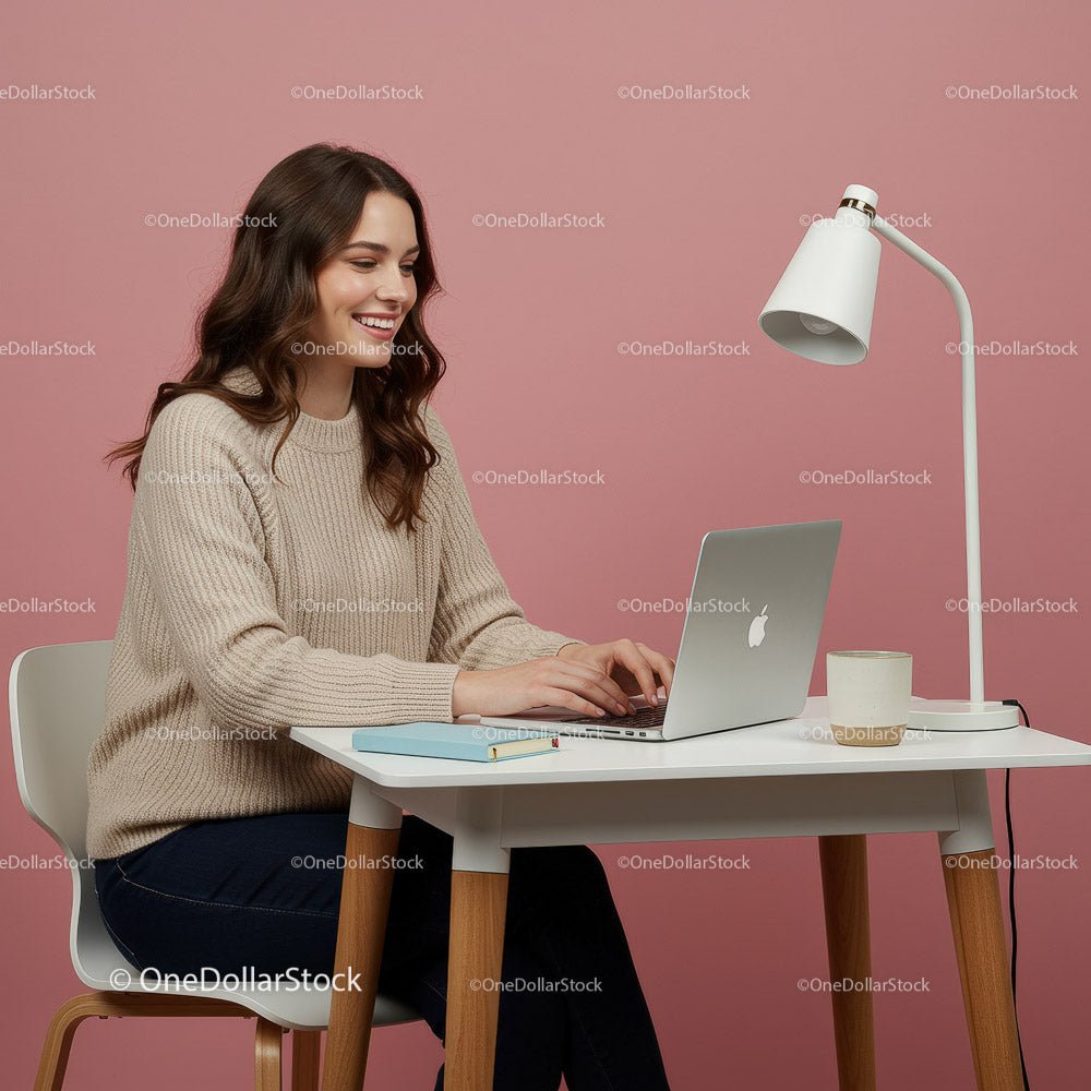 Smiling Woman Using Laptop in Modern Home Office Setup