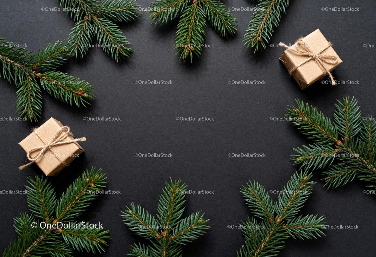 Minimalist Christmas flat lay with gift and pine branches
