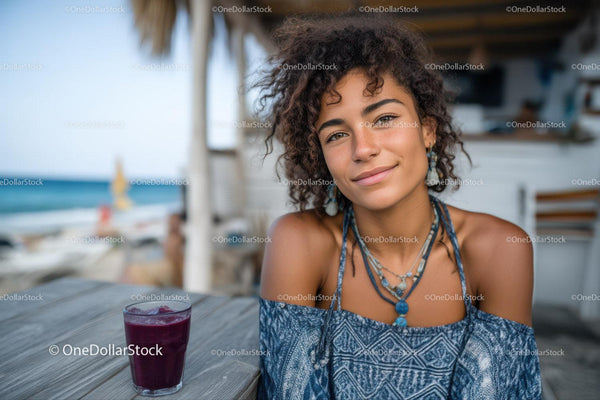 Young Woman Relaxing at Beachside Cafe Showing Warm Friendly Smile