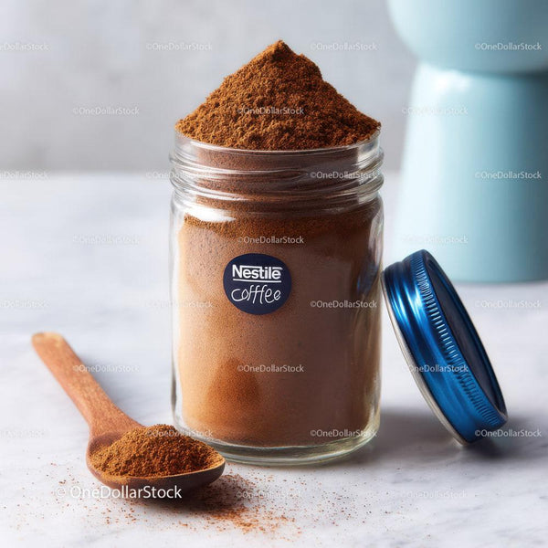 Ground Coffee in a Transparent Jar with a Wooden Spoon on White Surface
