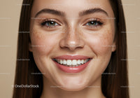 Close-Up Portrait of Smiling Woman with Freckles