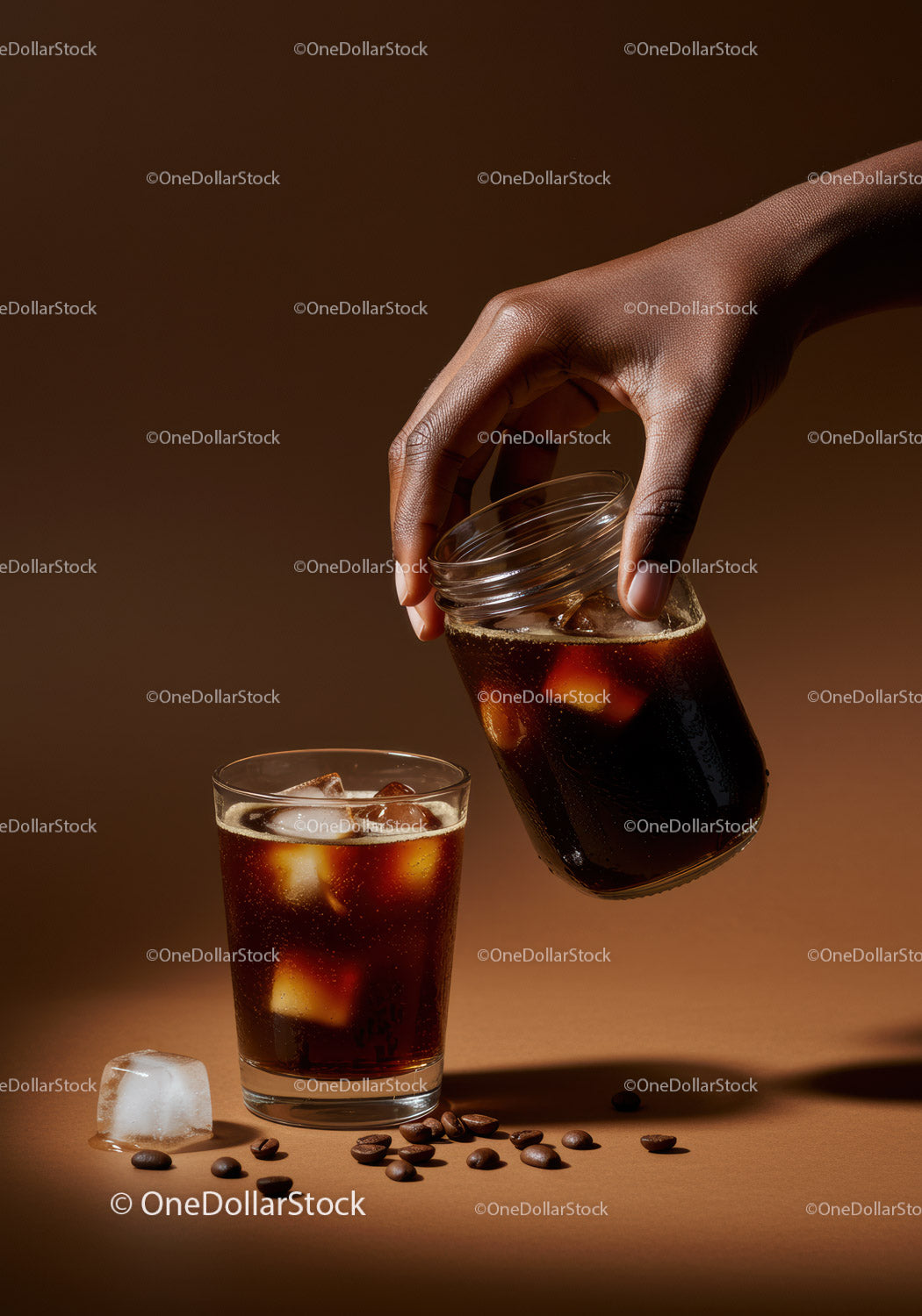 Hand Pouring Cold Brew Coffee Over Ice Cubes