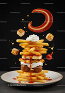Stack of French Fries with Meatballs and Sauces on Plate