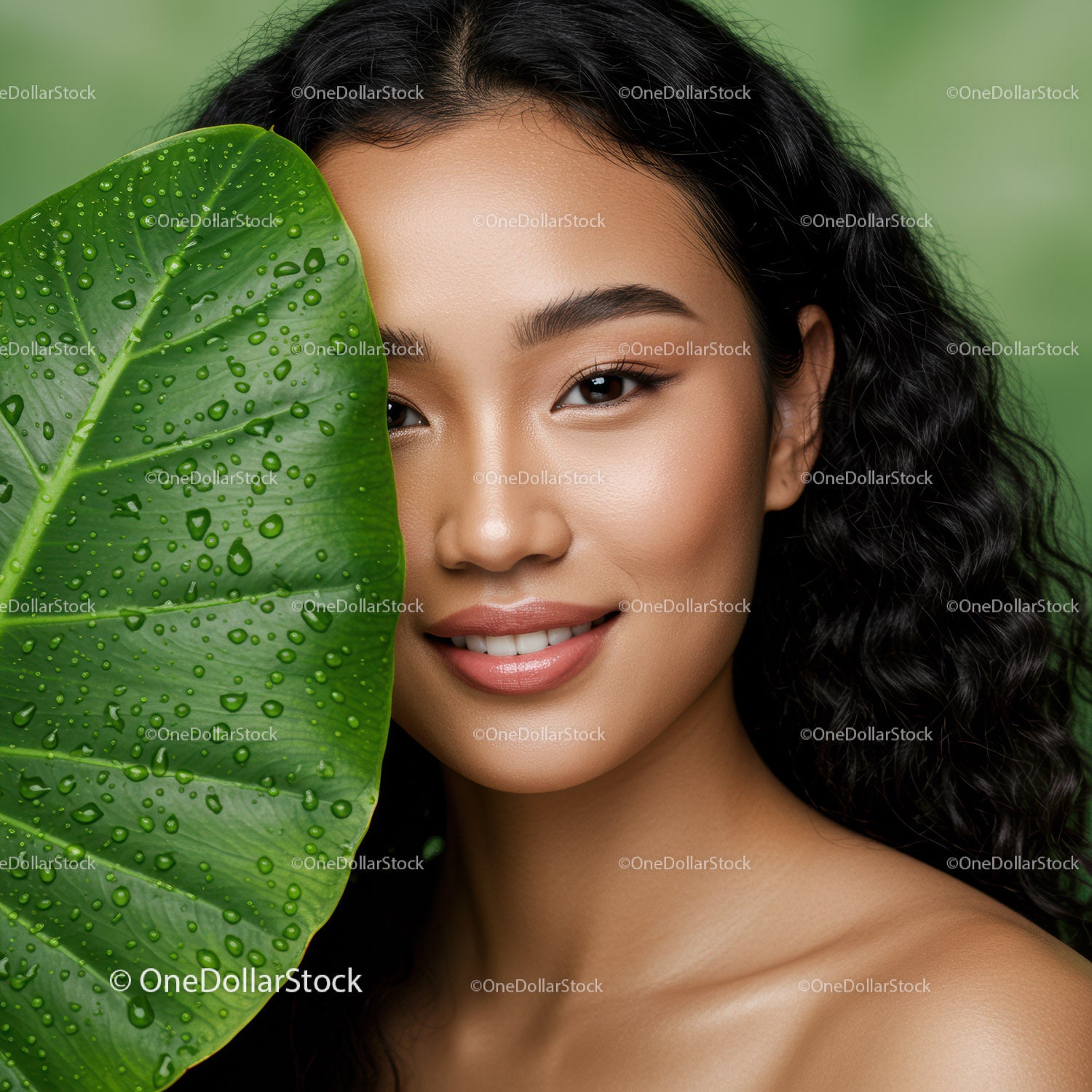 Portrait of a Beautiful Woman with a Tropical Leaf and Black Curly Hair