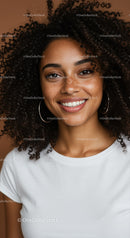 Young Woman with Curly Hair and Freckles Smiling Portrait