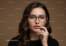 Elegant Young Woman in Glasses with Confident Expression