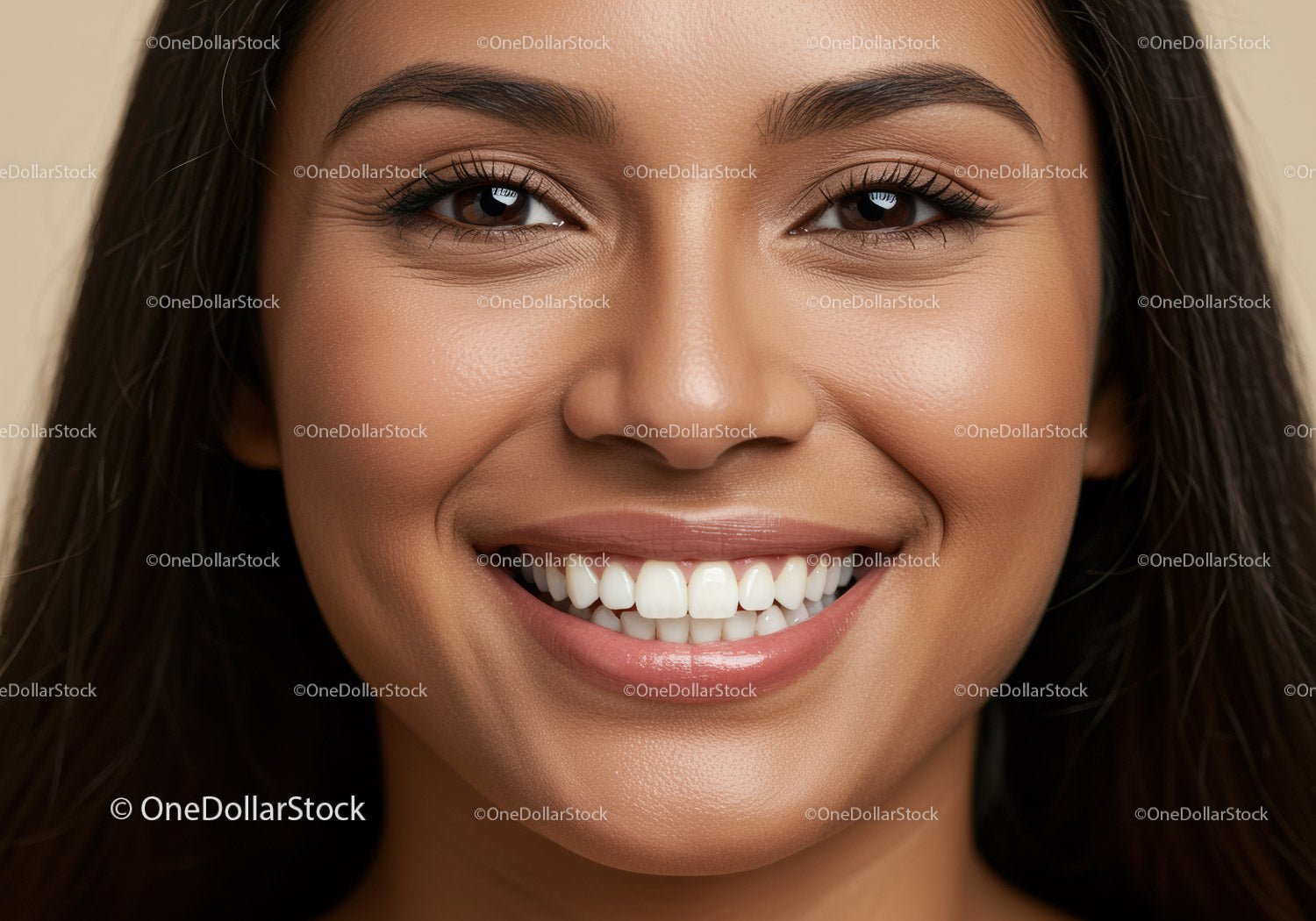 Close-up of smiling woman with flawless skin