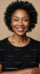 Confident Smiling Woman with Curly Hair in a Professional Portrait