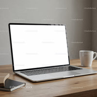 Minimalist workspace with modern laptop and coffee mug