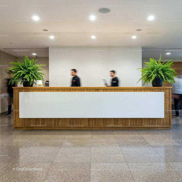 Modern reception area with wooden desk and green plants JPG Mockup Image