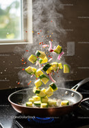 Fresh vegetables sizzling in a frying pan on stove