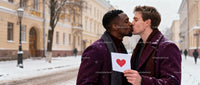 Couple Sharing Romantic Kiss Outdoors in Winter Snow