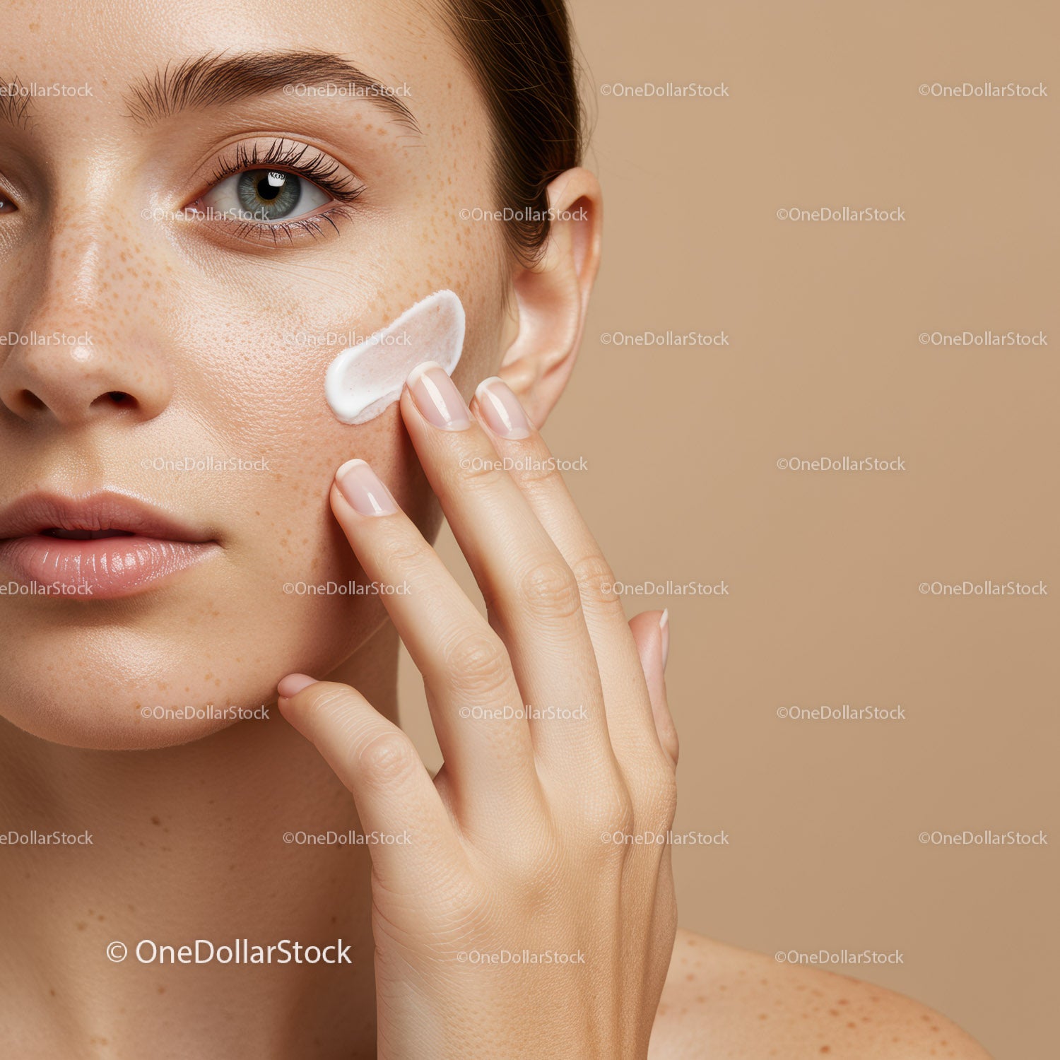 Close-Up of Woman Applying Skincare Cream to Cheek for Healthy Skin