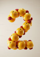 Number two shaped from fresh oranges and strawberries