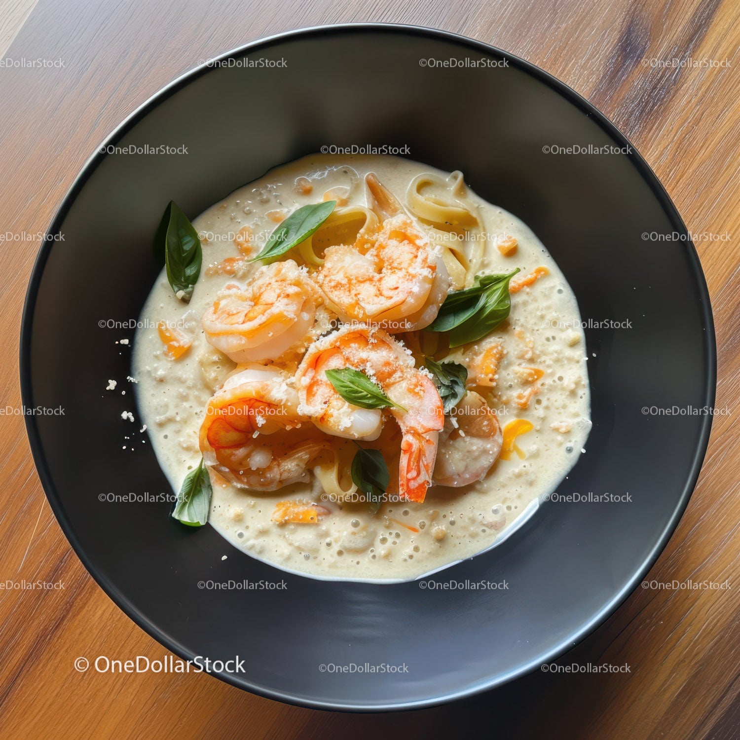Shrimp Pasta with Basil in Creamy Sauce in a Modern Black Bowl