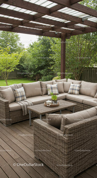 Modern Outdoor Patio with Wicker Sofa and Greenery