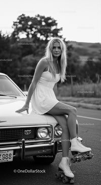 Young Woman in White Dress Sitting on Classic Car with Roller Skates