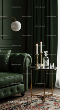 Cozy vintage living room with green leather sofa and candles