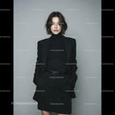 Stylish Woman in Black Pinstripe Suit for Business or Fashion