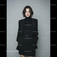 Stylish Woman in Black Pinstripe Suit for Business or Fashion