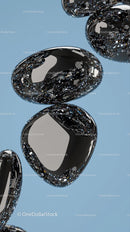 Abstract Reflective Black Metallic Ovals for Modern Design