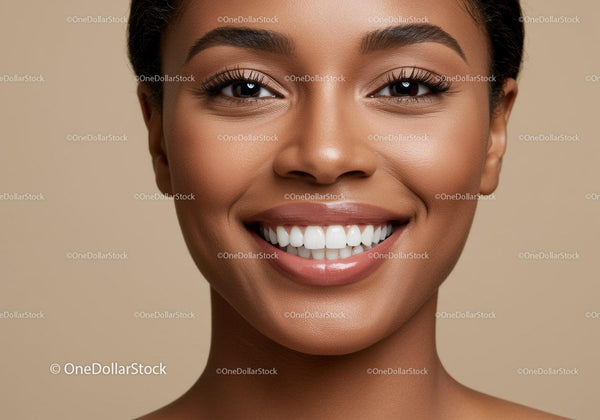 Closeup of smiling woman with flawless glowing skin