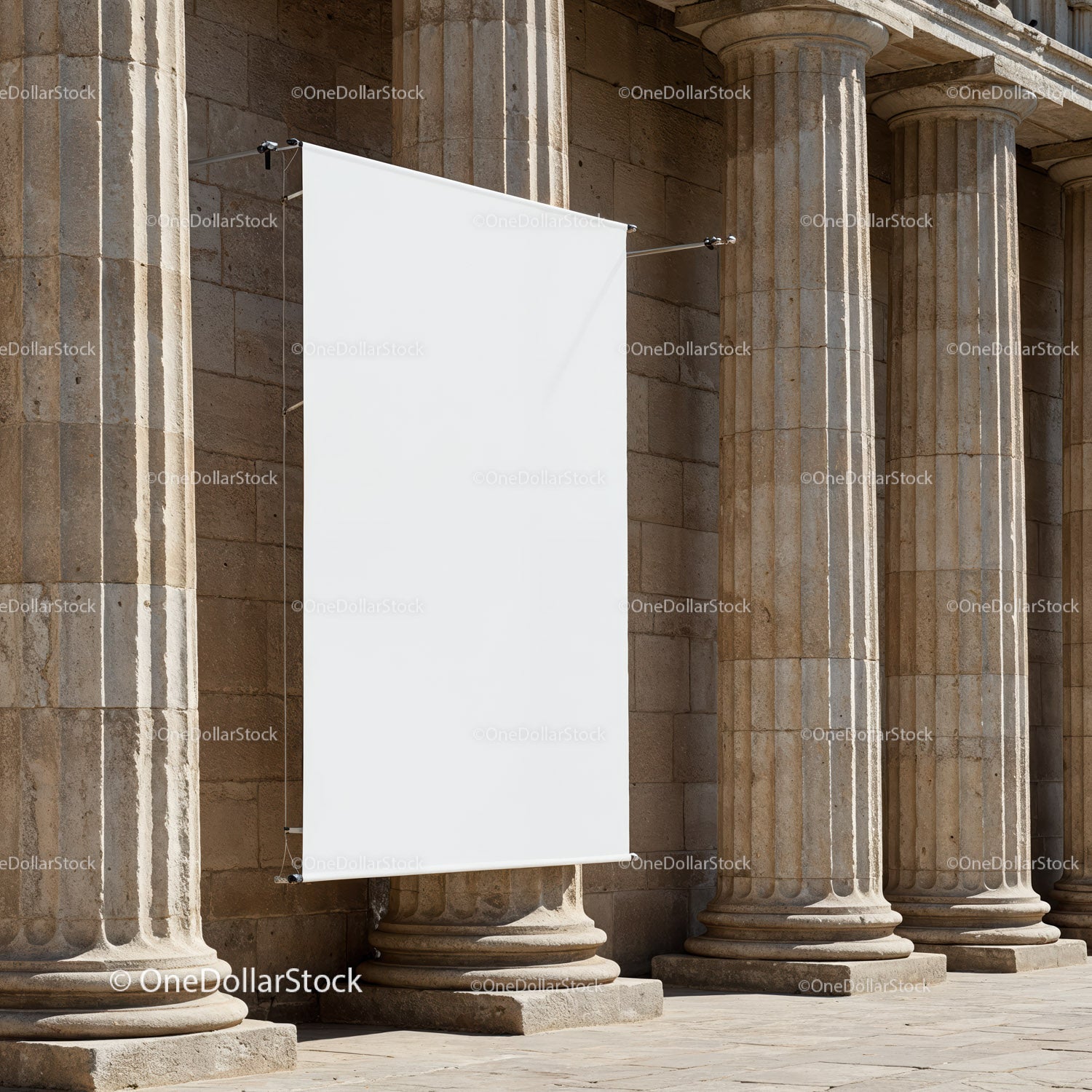 Blank Banner Hanging on Historic Stone Columns
