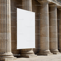 Blank Banner Hanging on Historic Stone Columns