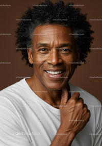 Portrait of Smiling Elderly Man with Afro Hair and Warm Expression