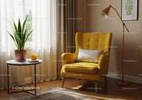 Cozy yellow armchair with indoor plant and orange juice