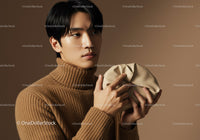 Young Man in Beige Turtleneck Sweater with Neutral Background