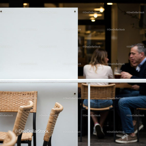 Casual gathering of friends at outdoor cafe seating JPG Mockup Image