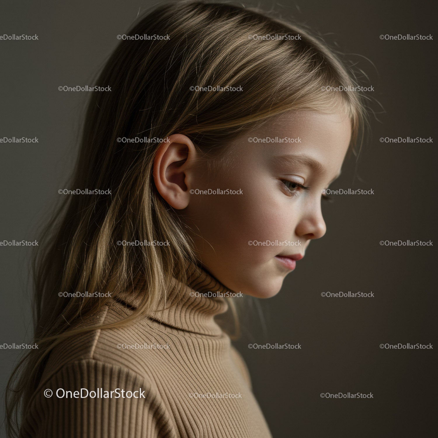 Thoughtful young girl in beige turtleneck sweater